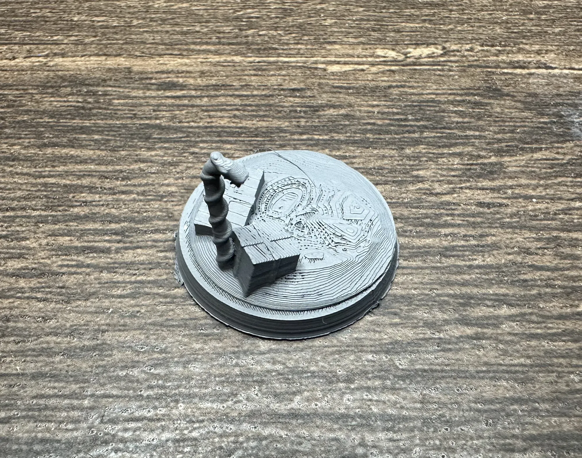 Christmas base with standing candy cane and presents at the base