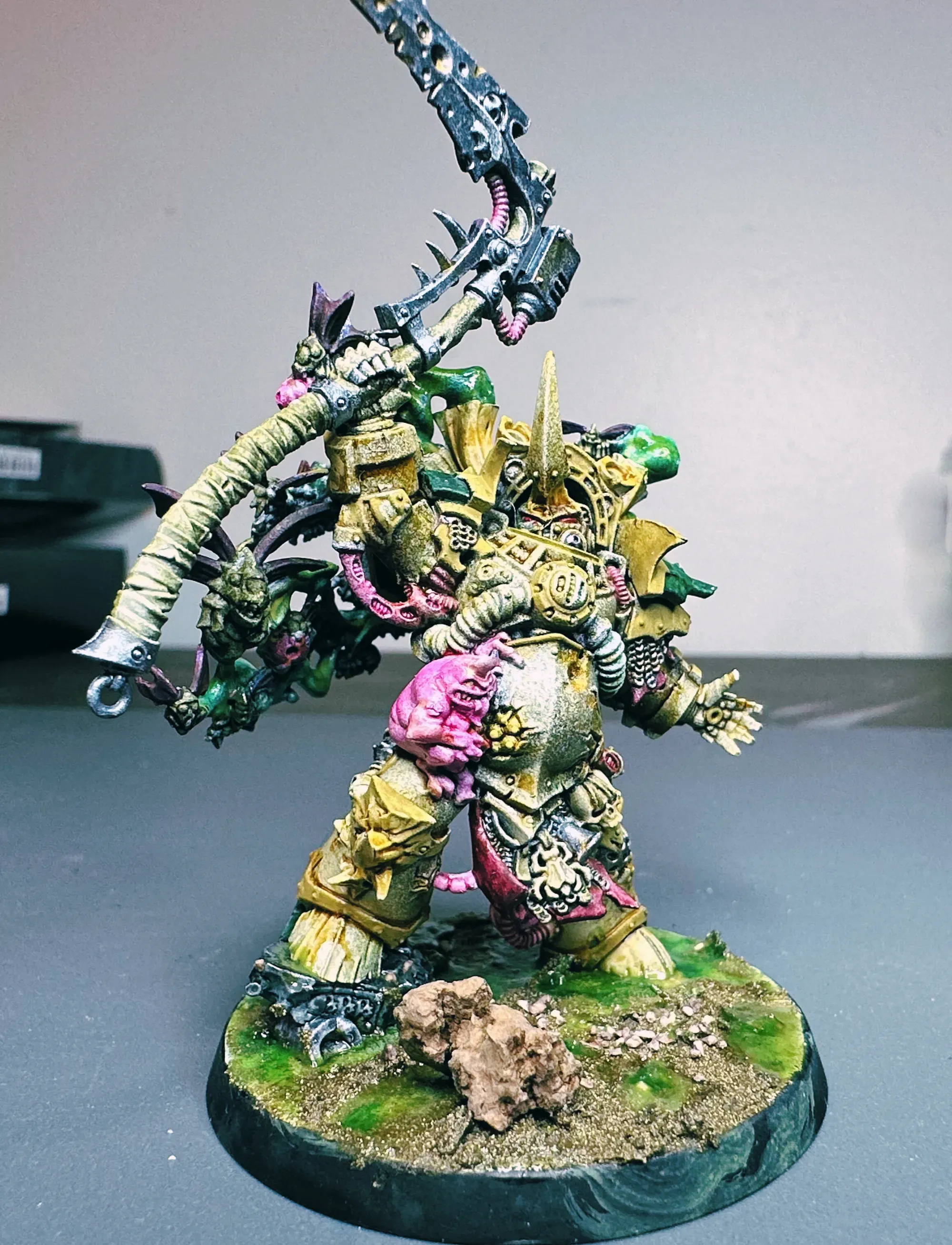 Typhus, Herald of Nurgle — Death Guard character in bone armor with pink corruption and green shoulder pad