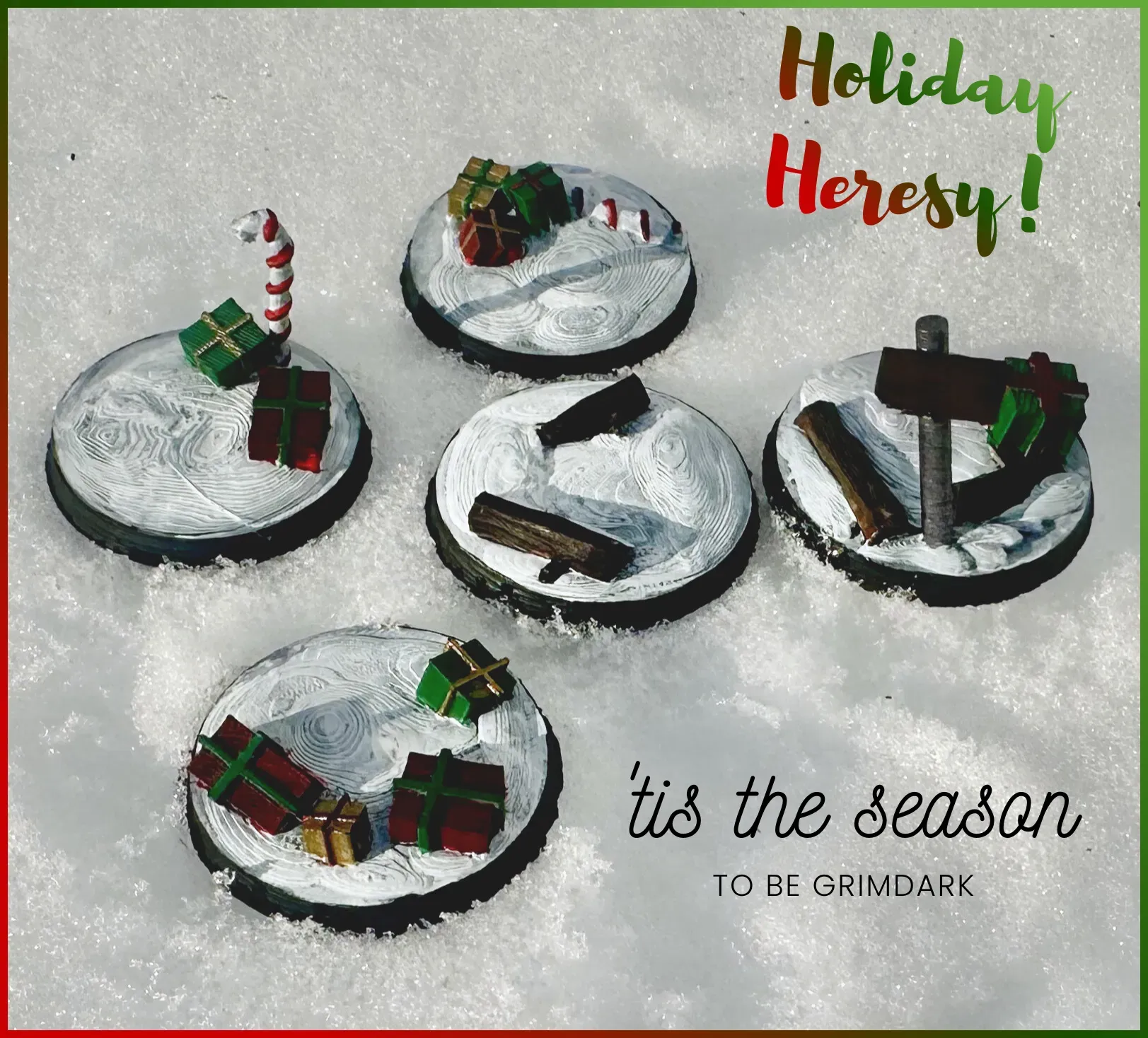 Five painted Christmas themed miniature bases arranged in snow