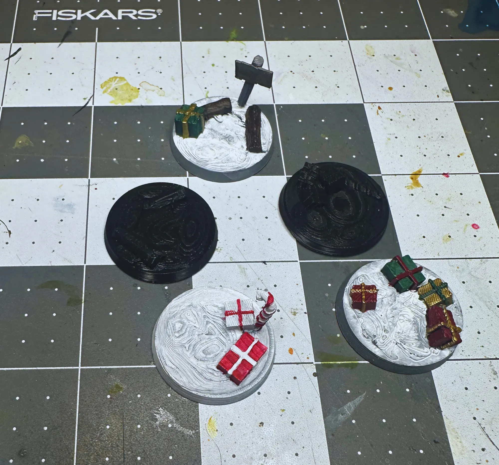 All five Christmas bases together showing variety of holiday designs