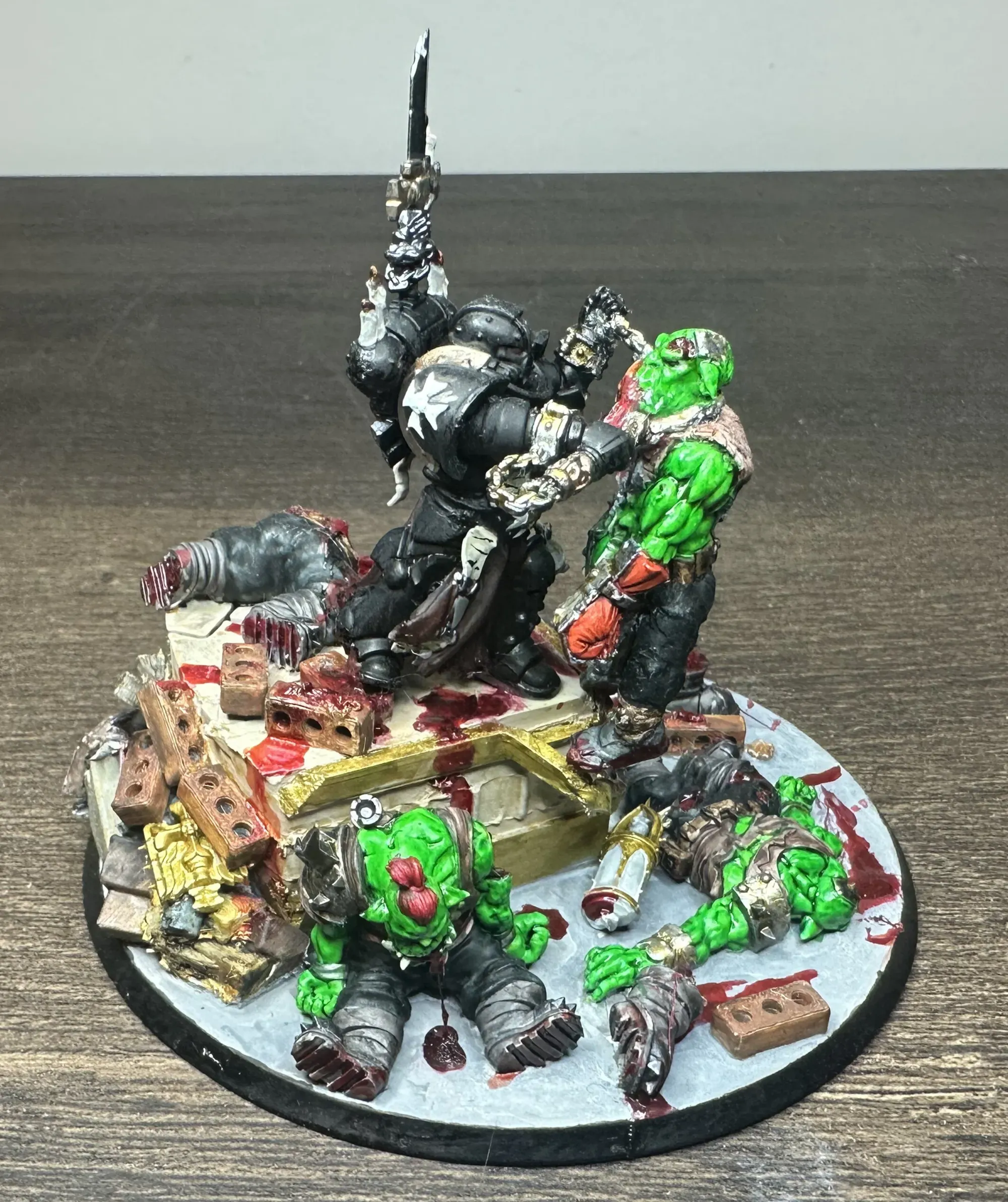 Side view of Helsreach diorama showing Grimaldus strangling the ork amid cathedral rubble