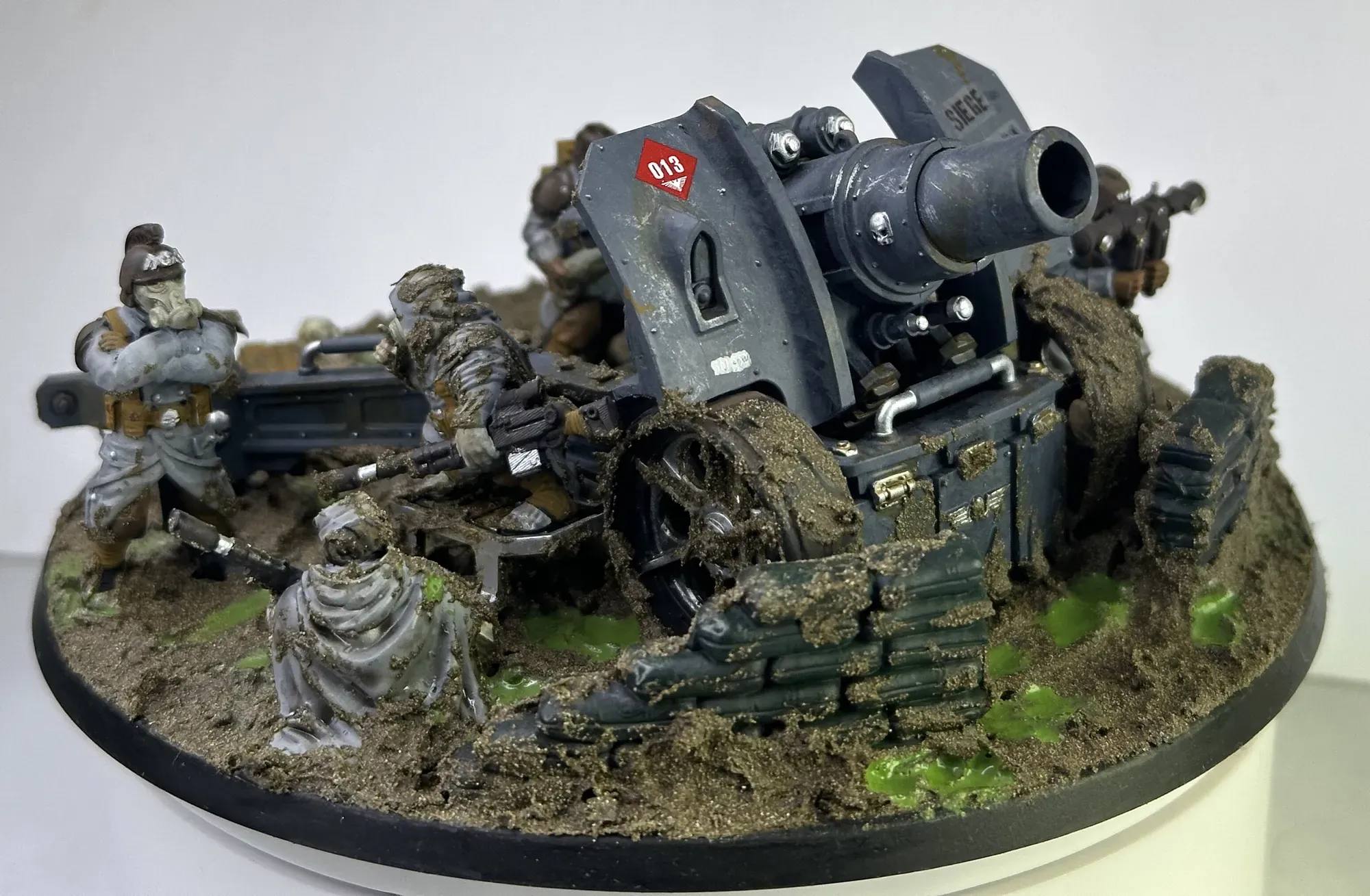 508th Siege Regiment Krieg artillery crew in position with sleeping soldier visible in the foreground