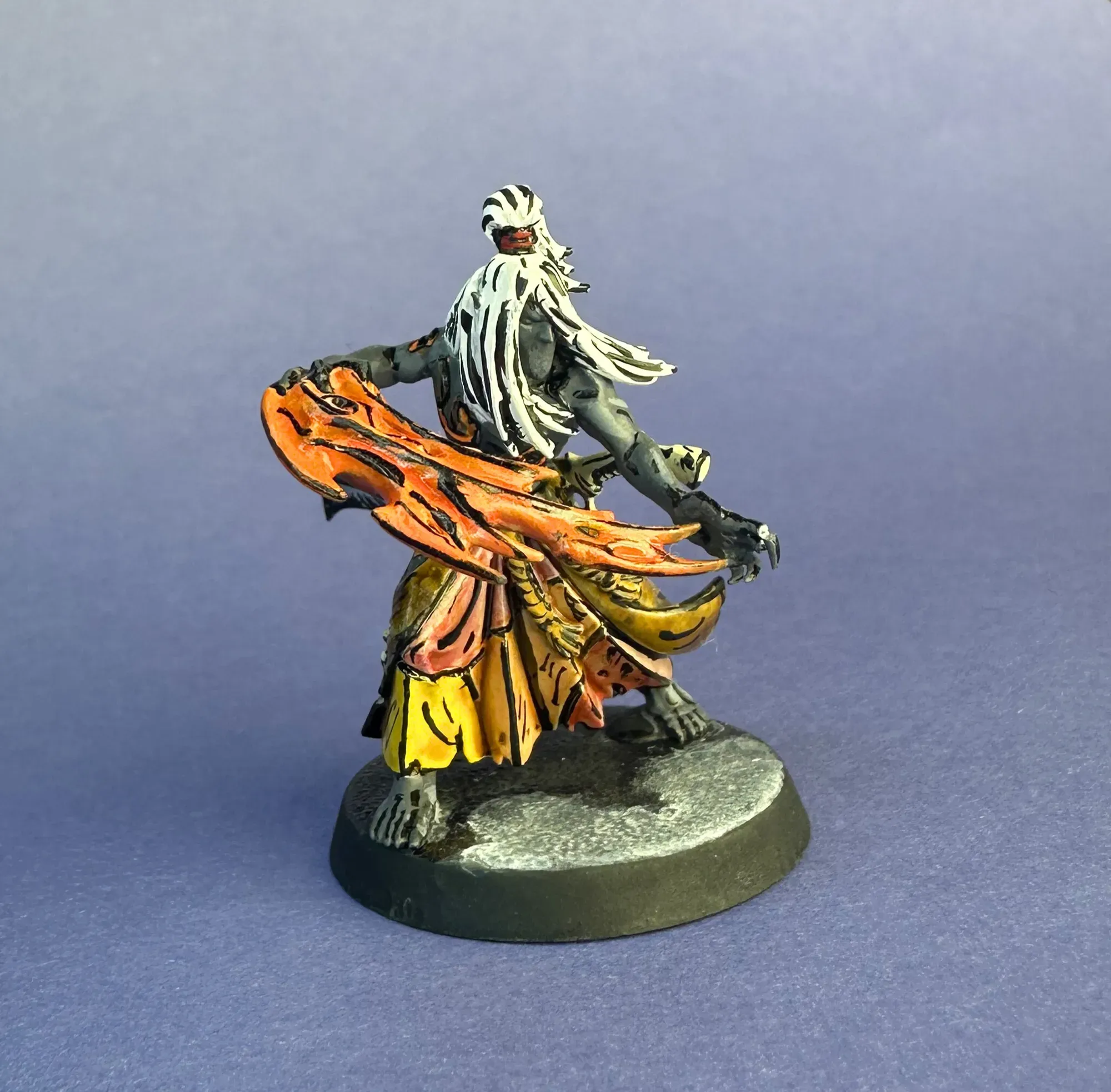 Mandrake with blue skin patches and orange flame effects
