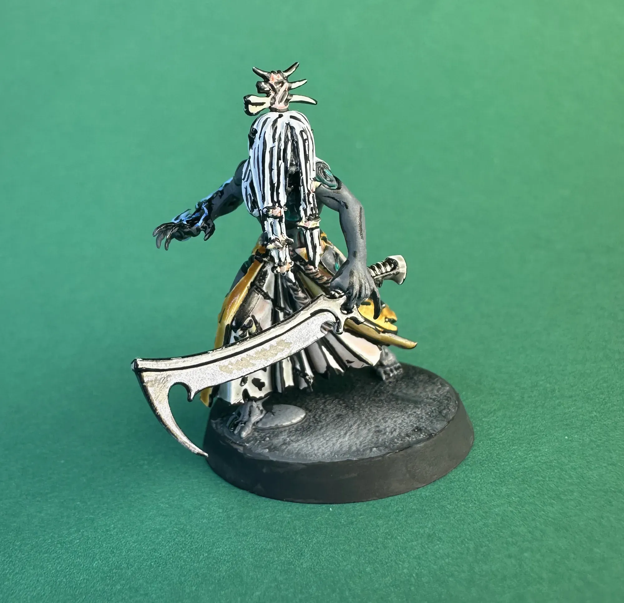 Mandrake with green skin patches and blue flame effects