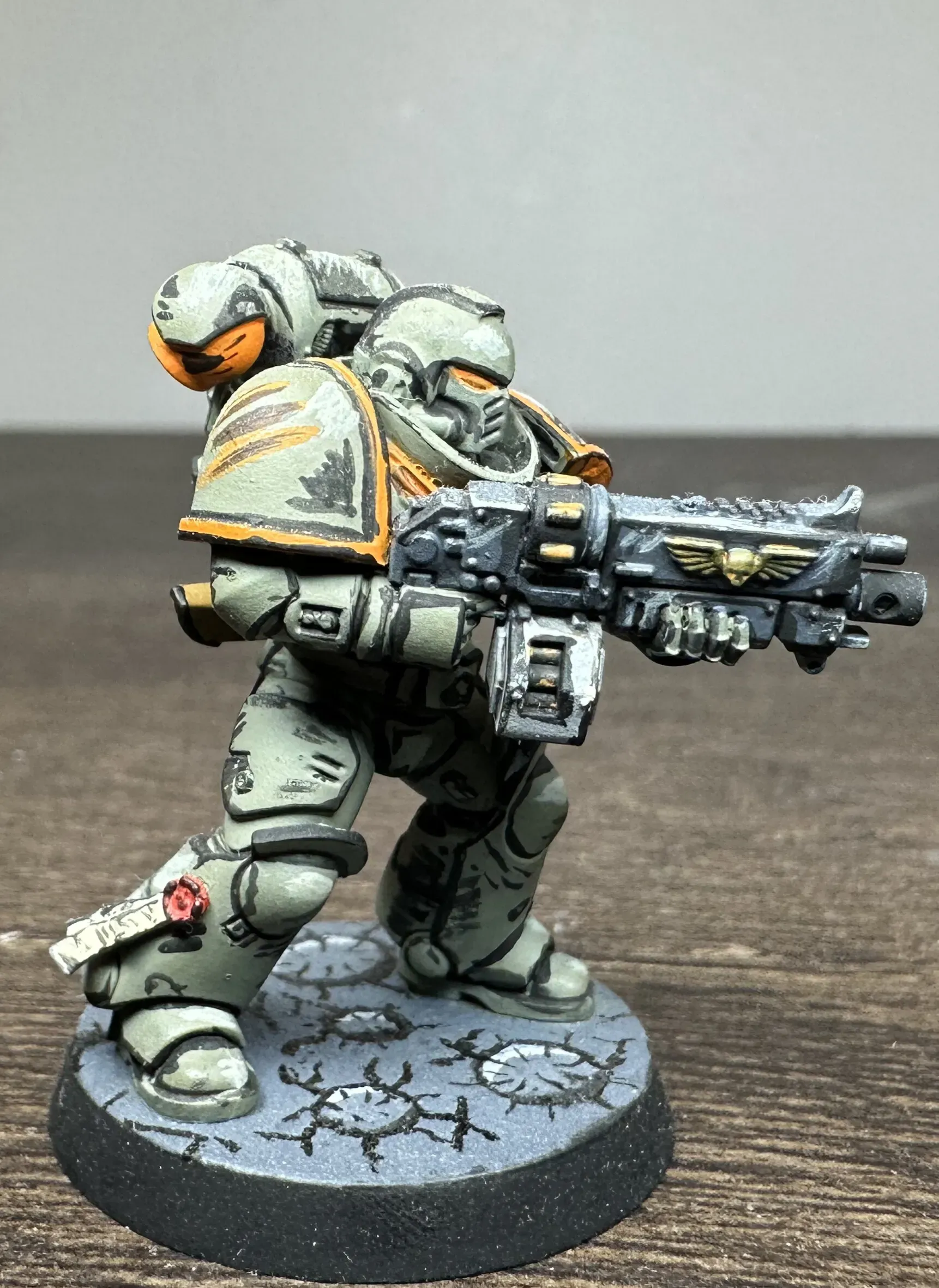 Side view of custom chapter marine showing shoulder pad and bolter detail